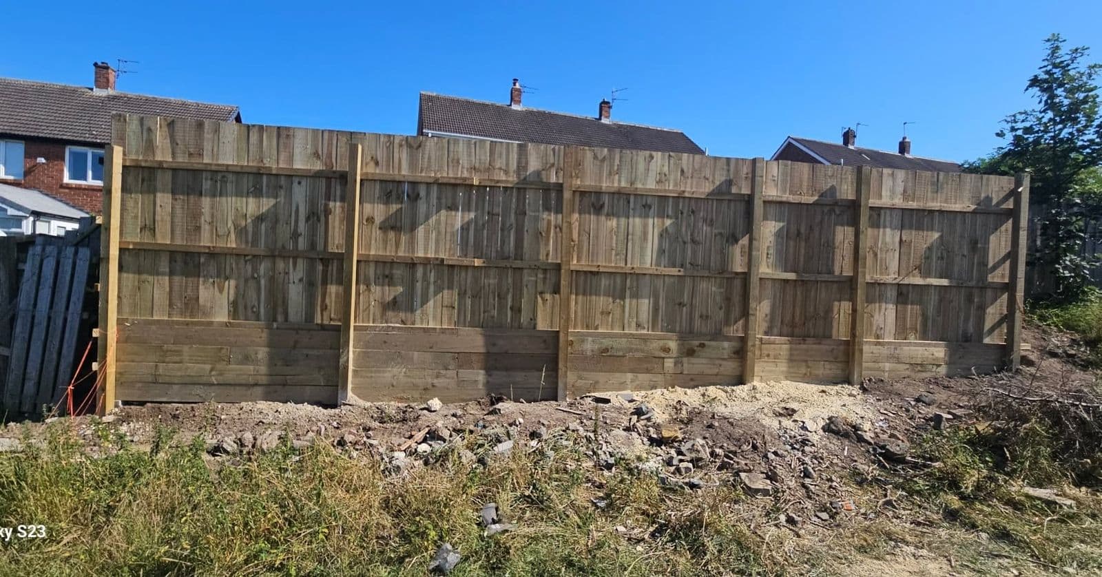 14ft fence and sleeper retaining wall in Boldon, photo 3 of 9