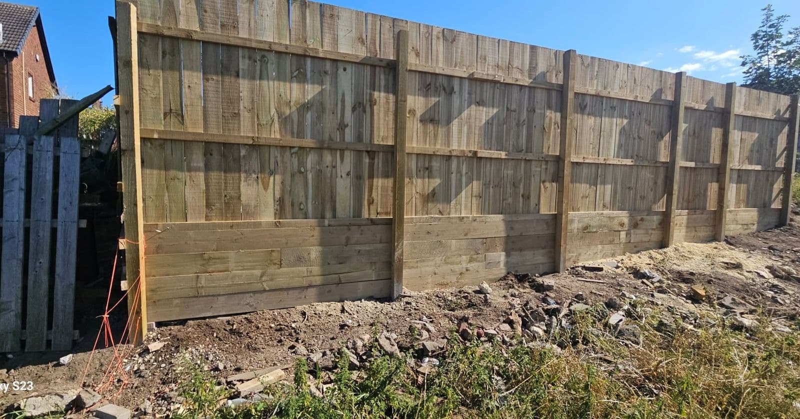 14ft fence and sleeper retaining wall in Boldon, photo 4 of 9