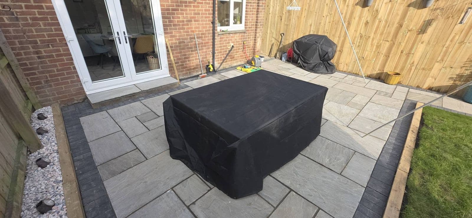 Grey sandstone patio and new fence, photo 3 of 12