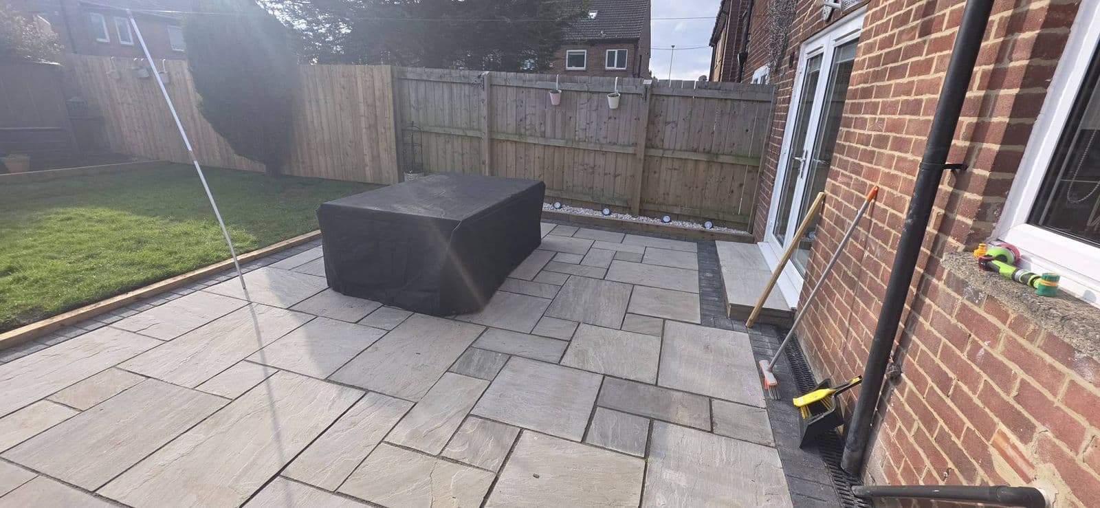 Grey sandstone patio and new fence, photo 4 of 12