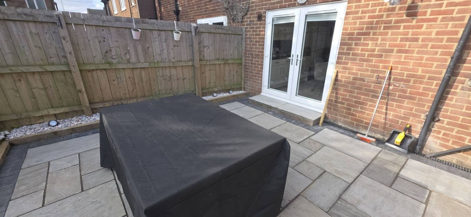 Grey sandstone patio and new fence, photo 5 of 12