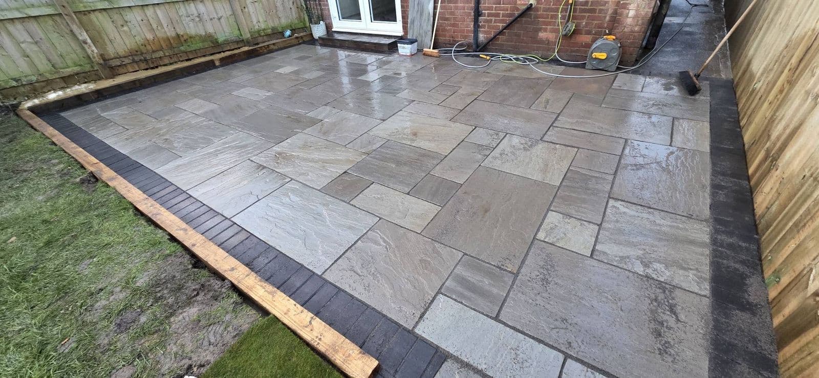 Grey sandstone patio and new fence, photo 9 of 12