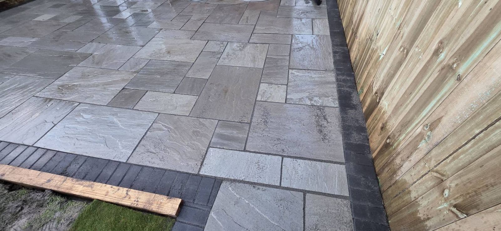 Grey sandstone patio and new fence, photo 10 of 12