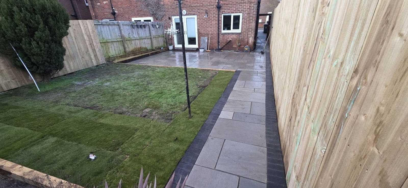 Grey sandstone patio and new fence, photo 11 of 12