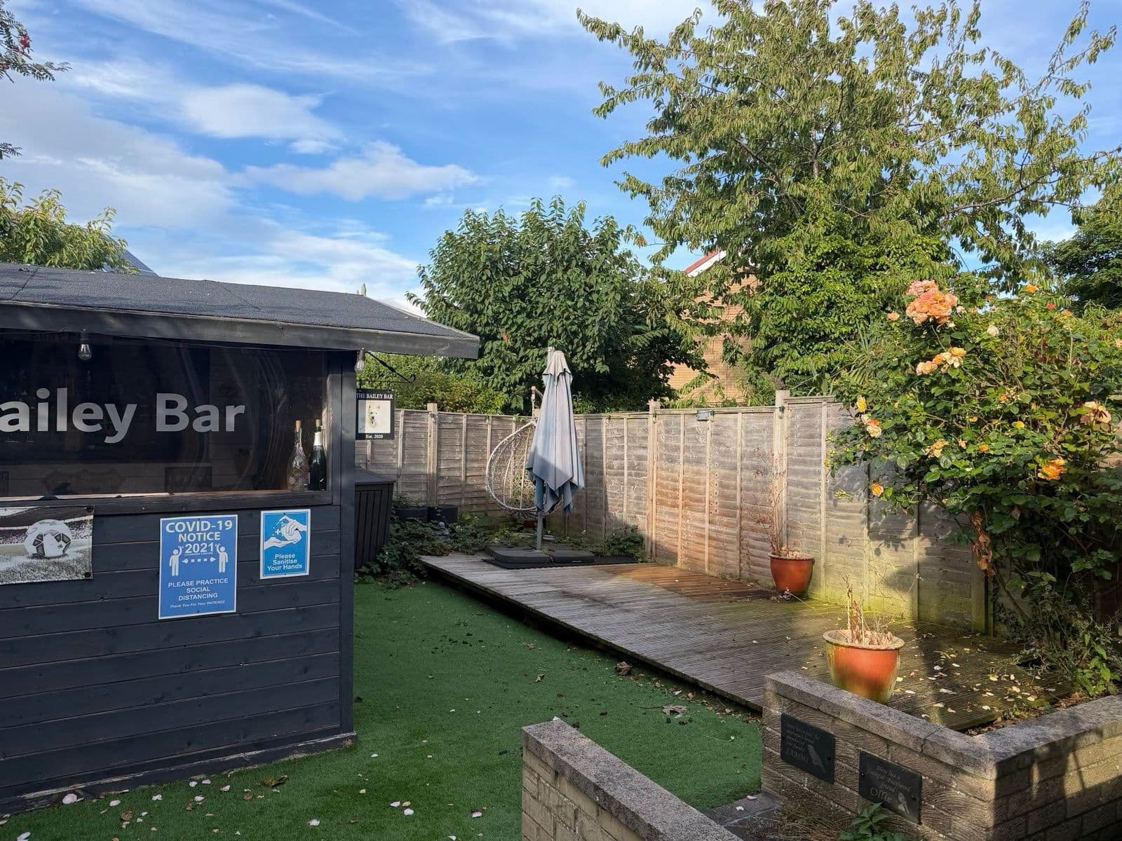 Grey sandstone patio and sleeper planters in Gateshead, photo 9 of 10