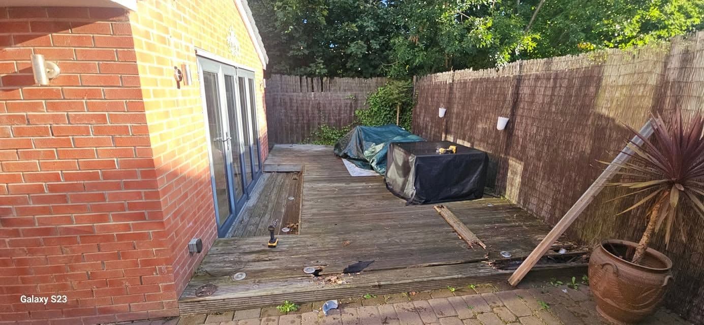 Rotten decking replaced with sandstone and artificial grass in Hebburn, photo 3 of 18