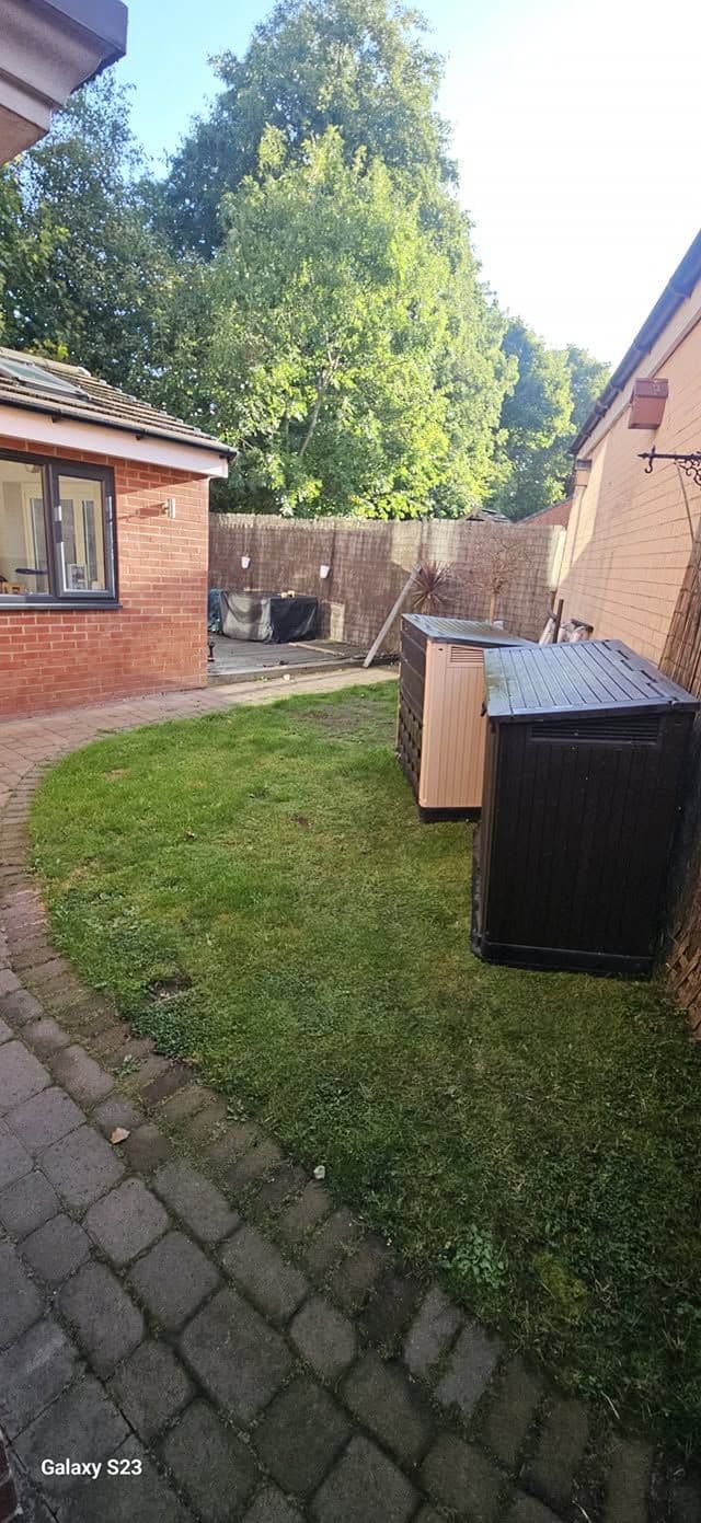 Rotten decking replaced with sandstone and artificial grass in Hebburn, photo 4 of 18