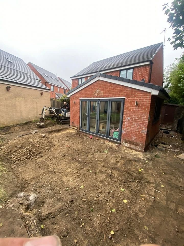 Rotten decking replaced with sandstone and artificial grass in Hebburn, photo 5 of 18