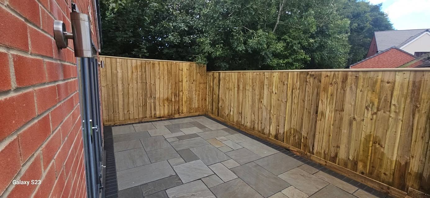 Rotten decking replaced with sandstone and artificial grass in Hebburn, photo 12 of 18