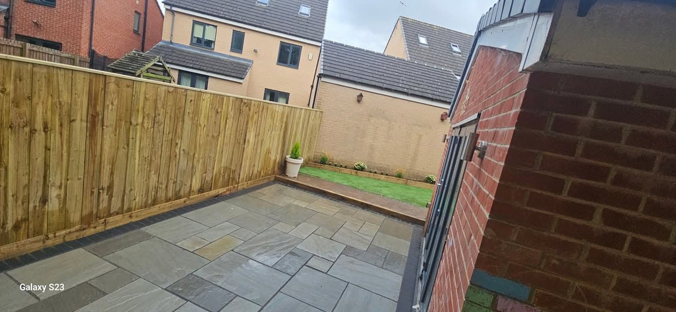 Rotten decking replaced with sandstone and artificial grass in Hebburn, photo 14 of 18