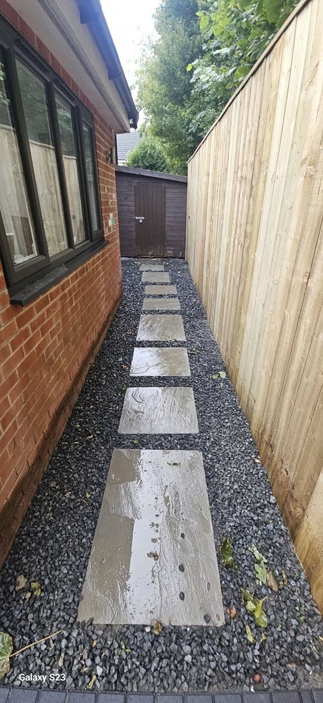 Rotten decking replaced with sandstone and artificial grass in Hebburn, photo 15 of 18