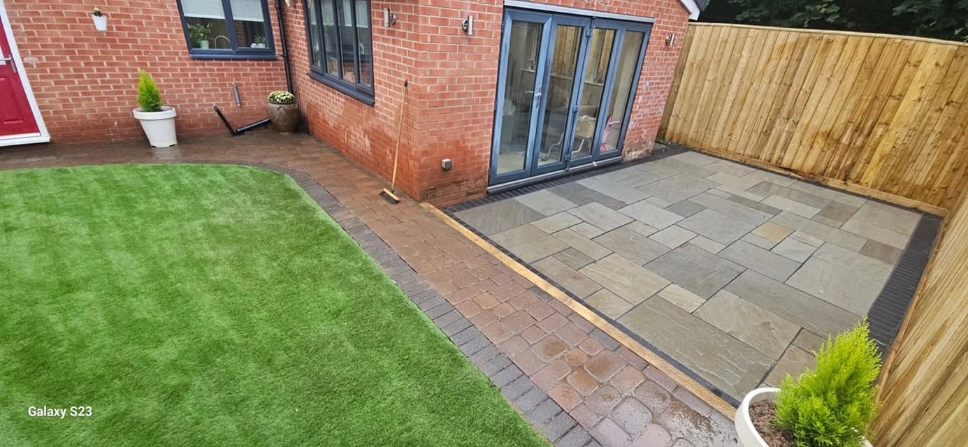 Rotten decking replaced with sandstone and artificial grass in Hebburn, photo 18 of 18