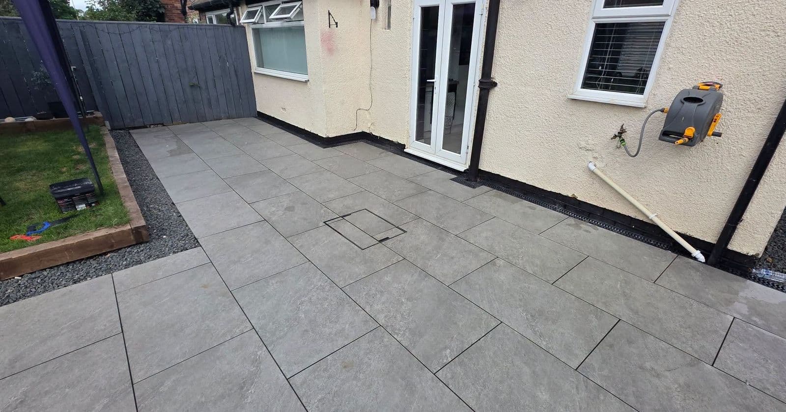 Grey porcelain patio with drainage in Hebburn, photo 3 of 10