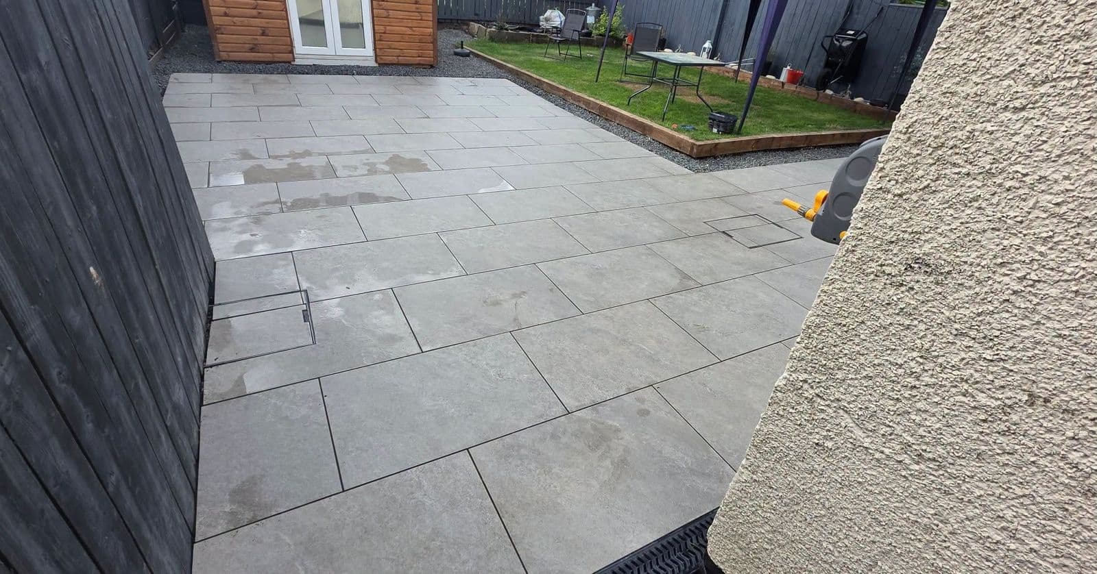 Grey porcelain patio with drainage in Hebburn, photo 4 of 10