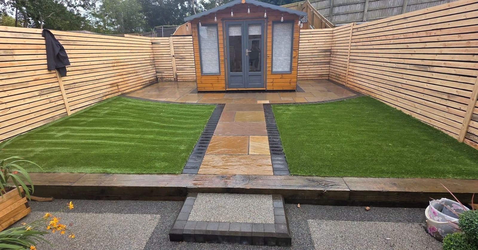 Harvest sandstone, ranch fencing and artificial grass in Hebburn