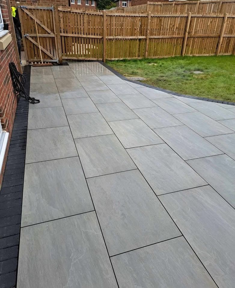 Porcelain patio with charcoal border in Jarrow (Lakes Estate)