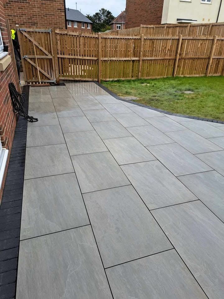 Porcelain patio with charcoal border in Jarrow (Lakes Estate), photo 4 of 16
