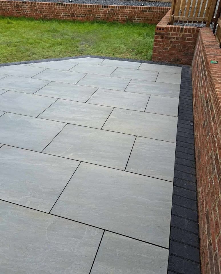 Porcelain patio with charcoal border in Jarrow (Lakes Estate), photo 6 of 16