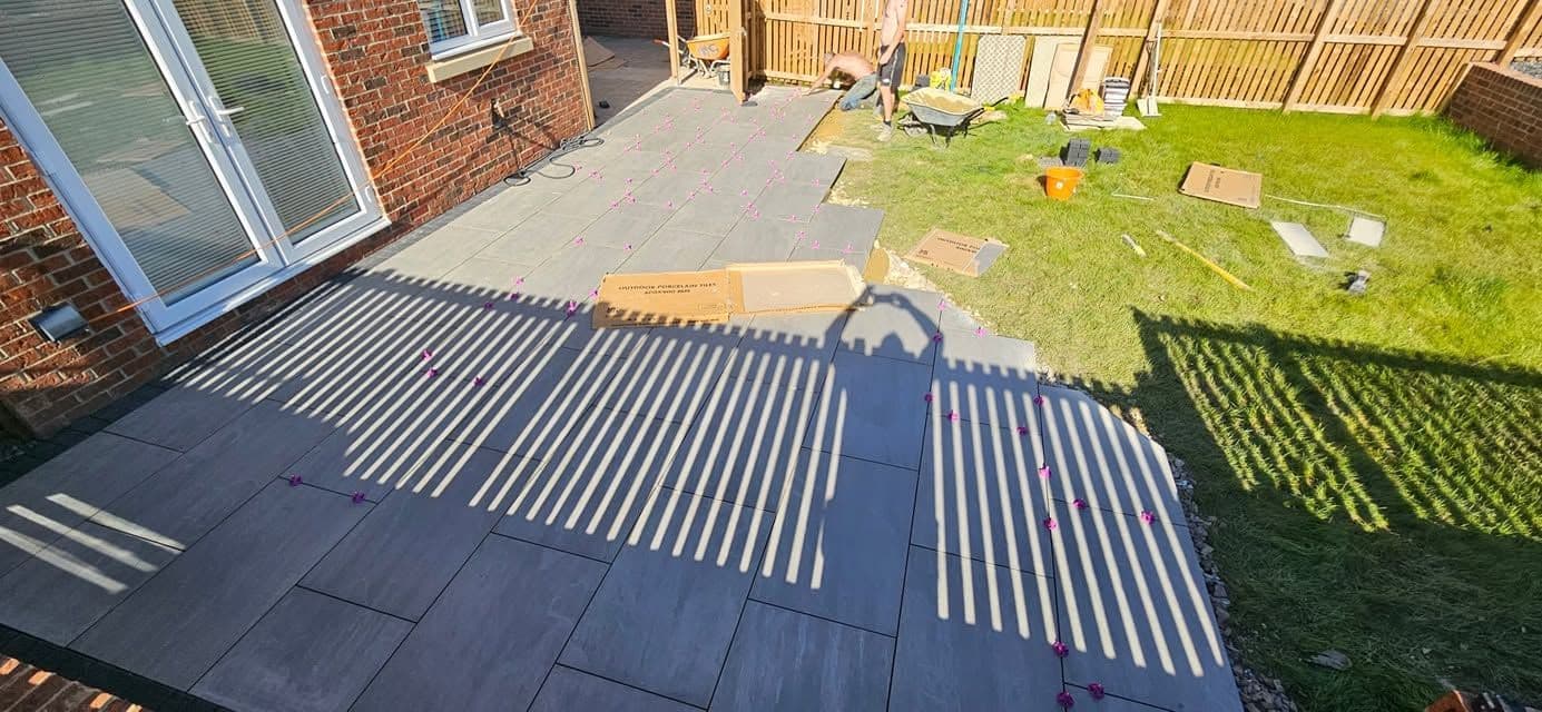 Porcelain patio with charcoal border in Jarrow (Lakes Estate), photo 8 of 16
