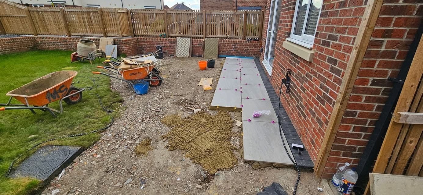 Porcelain patio with charcoal border in Jarrow (Lakes Estate), photo 10 of 16