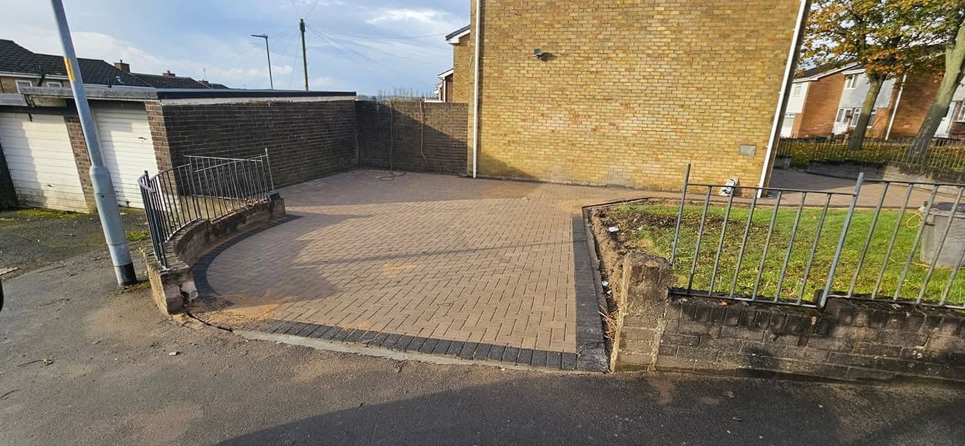 Natural grey block paving driveway