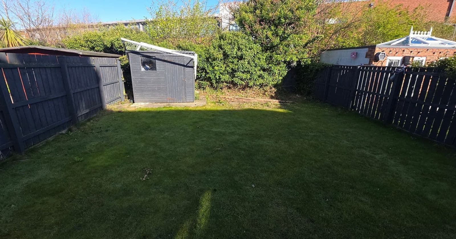 Before: Porcelain patio and new lawn in South Shields
