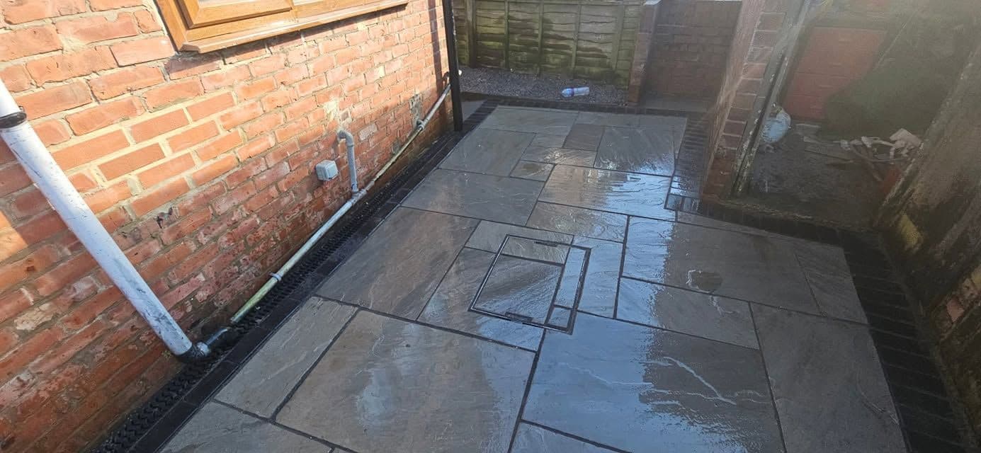 Indian sandstone patio and two artificial lawns in Wardley, photo 3 of 22