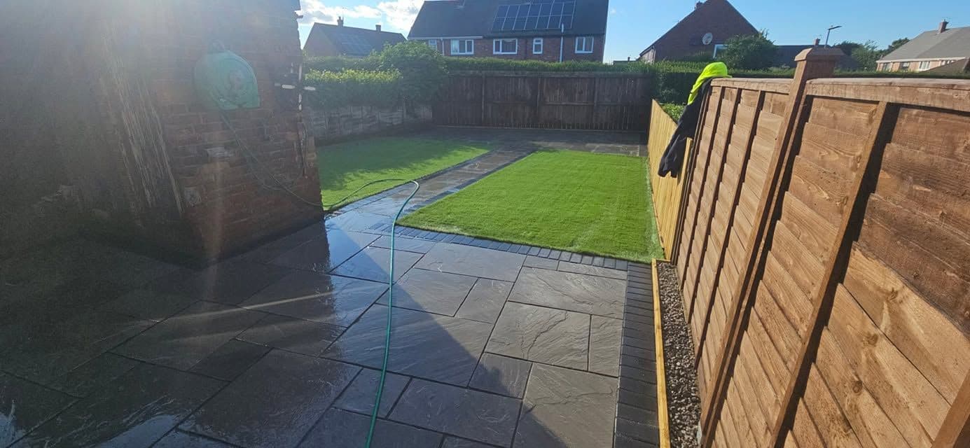 Indian sandstone patio and two artificial lawns in Wardley, photo 5 of 22