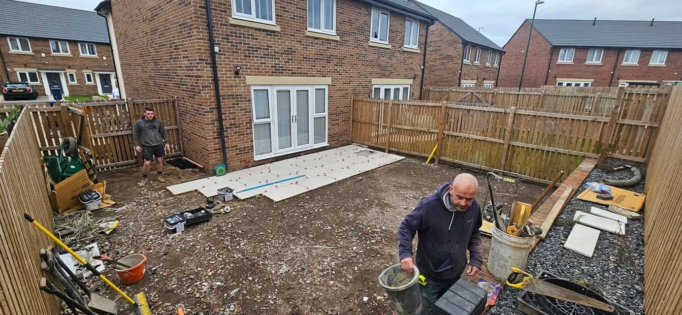 White porcelain patio framing an artificial lawn, photo 14 of 21