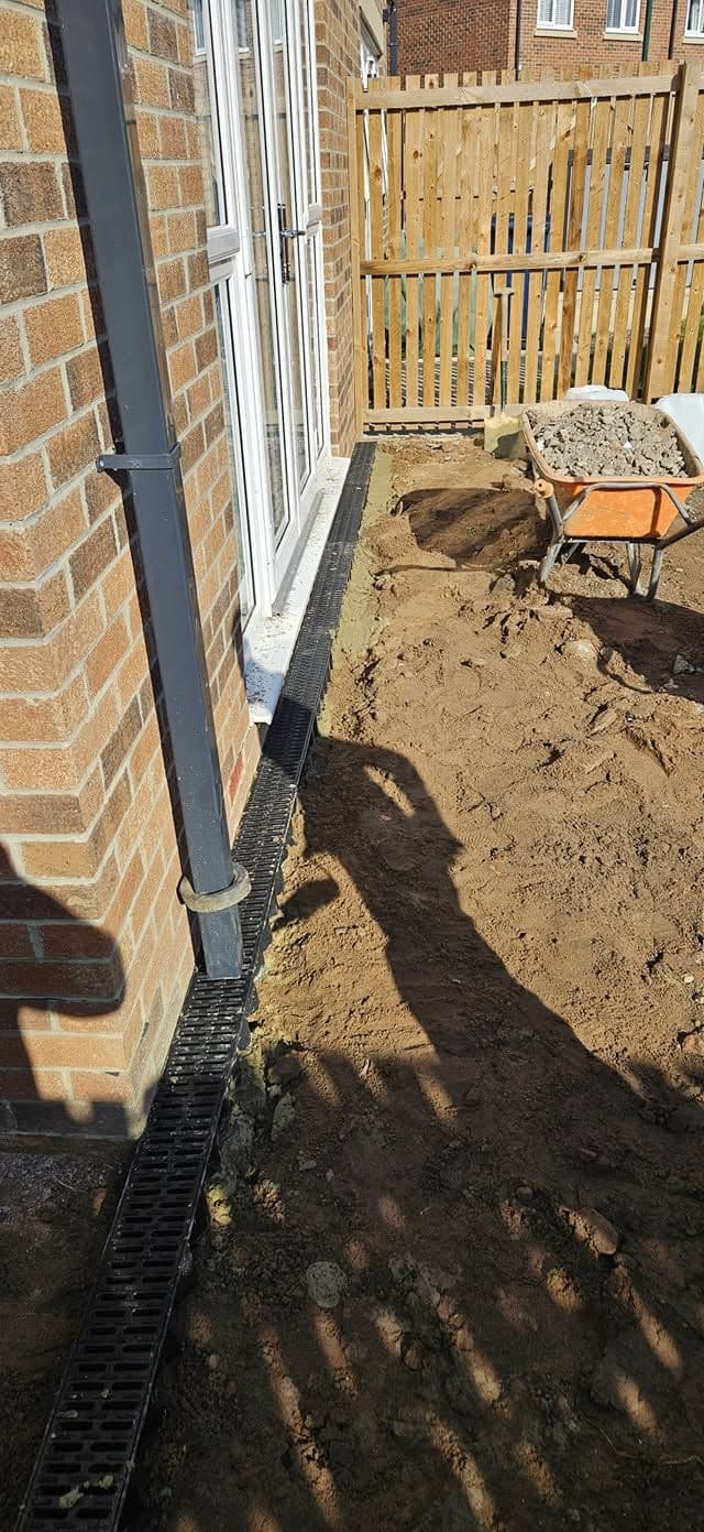 White porcelain patio framing an artificial lawn, photo 17 of 21